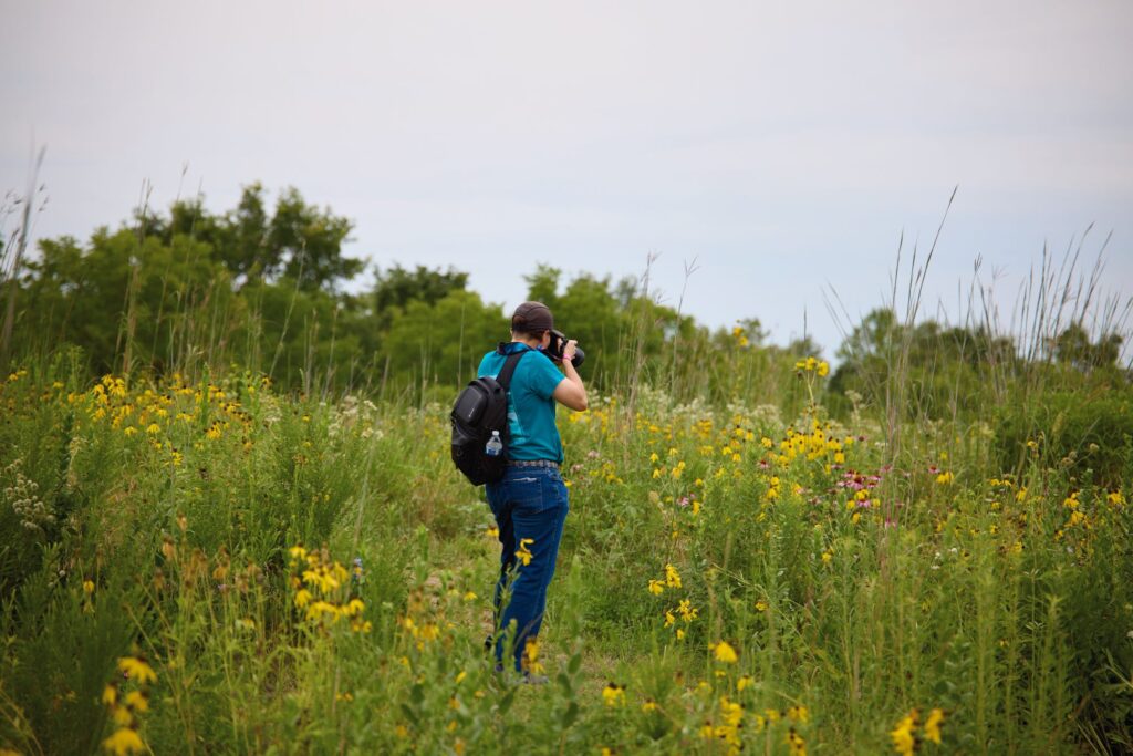 Photographer in Wildflower Meadow at Powell Gardens